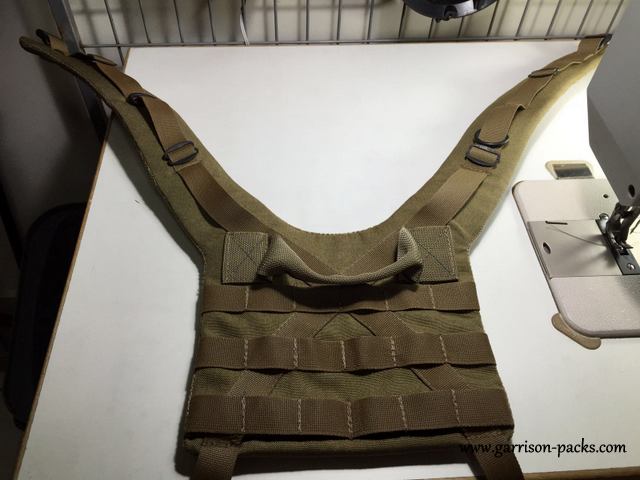 The molle panel allows for additional pouches or platform to hold other items